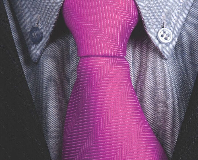 close up shot of pink neck tie